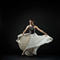 White_skirt_06 : The Motion library contains high-resolution photographic sequences of the human body in motion. Each Motion is artistically lit to highlight the anatomy and form of the human body as it moves. Ideal pose reference for animators, figurativ