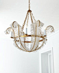 Handcrafted chandelier. Designed by Niermann Weeks for Visual Comfort. Iron and crystal. Uses six 60-watt bulbs. Direct wire; professional installation required. 34"Dia. x 34"T with 5"Dia. ceiling can