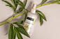 001 spray botlle cosmetics lotion clean leaves scene branding psd mockup