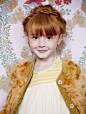 Love everything about her :hair, freckles, and of course her gorgeous faux fur cardie and beautiful smocked dress!