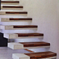 Floating concrete treads with timber inlay: 