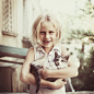 Photograph The happy girl with not so happy kitty:) by Daniil Kontorovich on 500px