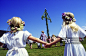 Midsummer dance around a maypole