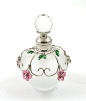 Round frosted perfume bottle with flower decoration