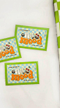 This may contain: three green and white tags with the words bon bon on them are sitting next to a checkered table cloth