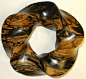 Alex J Feingold. New stripped ebony carving made of a (3,5) torus knot.