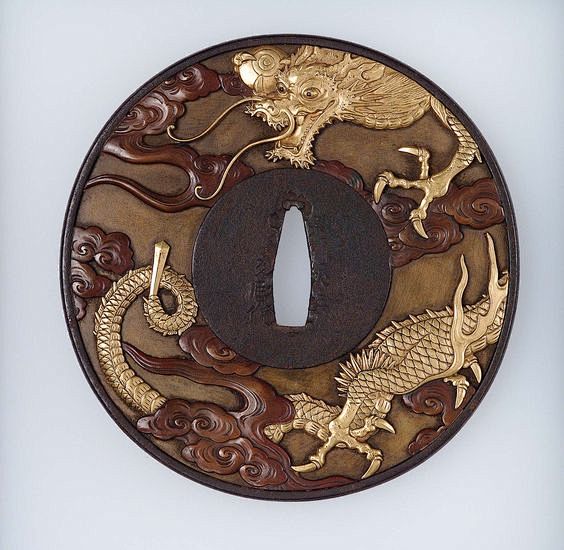 Tsuba with design of...