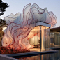 This may contain: an artisticly designed building with water and trees in the foreground, at dusk