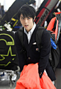 Pyeongchang Olympics men's figure skating gold medalist Yuzuru Hanyu of Japan arrives at Yangyang airport eastern South Korea on his way back to...