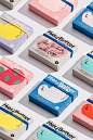 many different colored boxes with writing on them