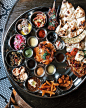 beautifulcuisinesThe Hindi word “thali” literally translates to “plate” in English and refers to a traditional Indian cuisine in which six key flavors are served together during a family-style meal. In London, Tandoor Chop House honors the Northern Indian