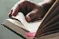 Close up man hands.Young man opening and reading a book,Close up man hands.Young man opening and reading a book,