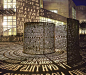 "A Comma",A, 2004. Plaza front of new library - University of Houston, TX - United States. Made from  copper, text, light, black granite paving inlay. Artist: Jim Sanborn.