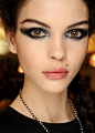 Feline eyes at Jean Paul Gaultier Spring 2013 Couture