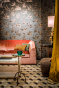 eclectic studio in laren the netherlands | oasis rooms | luxury interior design and italian furniture  : geometric pattern carpet, showy wall-coverings, golden frames characterize the eclectic interior design of this modern, warm, deco luxurious studio in