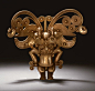 Masked Figure Pendant, 10th–16th century  Colombia; Tairona  Gold    H. 5 1/4 in. (13.3 cm)  Jan Mitchell and Sons Collection, Gift of Jan Mitchell, 1991 (1991.419.31)
