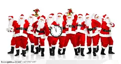 拿着时钟和圣诞节装饰的圣诞老人摄影背景桌面壁纸图片素材