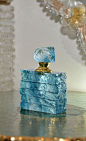 stunning light blue Liuli crystal perfume bottle with textured finish; With its unique look and style, this crystal perfume bottle is truly a work of art