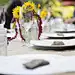 Menus under rocks on table at harvest dinner placesetting by Hero Images  on 500px