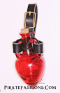 Here be a beautiful pirate's heart bottle. This be mounted on a black leather harness to attach to yar belt. Comes in two options: Royal Blue (darker than what