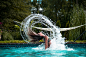 woman in swimming pool during daytime