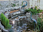 garden fountain with birds and natural stones are beautiful backyard landscaping ideas that feng shui a home