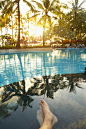 Feet of caucasian man in tropical swimming pool by Gable Denims on 500px