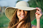 Young beauty woman in summer hat.