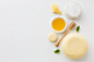 flat-lay-assortment-round-cheese-honey-with-copy-space_23-2148376084