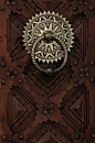 Incredible carved door & knocker.