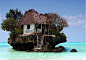 Restaurant on a cliff on the east coast of Zanzibar. Depending on the tide the restaurant can be reached both on foot and by boat.: 