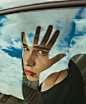 This photo uses the area where there is no reflection on the window instead of there is here is creating an interesting way to portray the subject