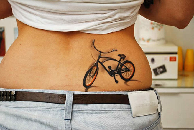 BMX tattoo on back b...