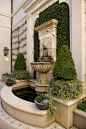 Symmetry helps create a restful courtyard in a garden featured on the River Oaks…: 