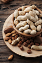 Mix of different nuts on the wooden table