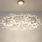 Bring the wonderment of the night sky into your home with The Night Sky hand-blown glass bedroom chandelier by Blown Glass Collective. This one-of-a-kind lighting fixture will bring the light and design to any space. These unique shapes and colors can be 