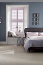 Dusty greys and blues with added hints of pale pink make the perfect calming bedroom interior. Mix different textures and modern furniture will complete the look. Our House Beautiful Shutters range is a perfect addition to the room.