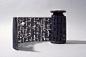 Black Torah by Robbin Ami Silverberg. Unique: 2003. 132″ x 6″.   Graphite flax paper (pulp sprayed) with text by artist about the Kabbalist Black Torah burnt out, and graphite text as commentary.