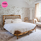 Bedroom Bliss. Gilded and tufted, with crystal, fur, and florals. Styling: The French Bedroom Company.: 