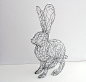 Jackrabbit Wire Sculpture - front left : 22 gauge galvanized steel; 13" tall x 8.75" long.  Inspired by the glorious vision of morning sun shining through a jackrabbit's ENORMOUS ears.