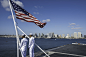 180513-N-EF115-020 : SAN DIEGO (May 13, 2018) Aviation Boatswain's Mate (Handling) 3rd Class Domonic Fraser, from Covington, Georgia, and Aviation Boatswain's Mate (Handling) Airman Adrian Roque, from Naples, Florida, prepare to shift colors on the flight