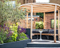 Garden Design - Ryecroft Road : This garden was conceived as a highly functioning entertainment area for rain or shine. The concept included two seating areas on different levels and an external kitchen area. We designed and built