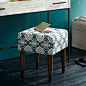 Ideal for vanities or extra bedroom seating, this compact Upholstered Tufted Stool is topped with light button tufting.