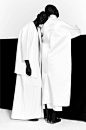 Minimal White Coat - bold minimalist style, black & white fashion editorial // Ph. Paul Jung