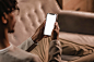 man-home-couch-using-smartphone_23-2148793475