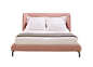 Desdemone Bed by Ligne Roset for Domo | est living Design Directory : The upholstered headboard of the Desdemone Bed by Ligne Roset is evocative of a shell: it is an invitation to read, to watch TV or even write.