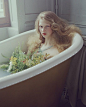 Beautiful who would have thought to put flowers in the bath tub?!!! So cool of a photo or in real life at tub time ! :): 