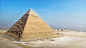 2.吉萨大金字塔（Great Pyramid of Giza）
公元前三千纪中叶，约公元前2631至前2498年。在尼罗河三角洲的吉萨（Giza），造了三座大金字塔，是由第四王朝的3位皇帝胡夫（Khufu）、哈弗拉(Khafra)和门卡乌拉(Menkaura)在公元前2600年—公元前2500年建造的。是古埃及金字塔最成熟的代表，也就是我们现在常说的大金字塔，在今开罗近郊，主要由大金字塔（也称胡夫金字塔）（Khufu）、哈弗拉（Khafra）、门卡乌拉金字塔（Menkaura）及大狮身人面像（Great 