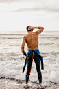 Full shot swimmer standing in water