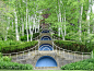 瑙姆科吉庄园是20世纪早期的一个经典作品。建造了午后花园，其空间借鉴了加州传统花园的形式。一个平台花园草地上斜向布置得弯曲的砾石带和中间的月季花坛与远处的熊山的曲线相呼应。蓝色阶梯展示了他运用透视法对地段富有想象力的处理，他既是园林也是雕塑，具有明显的新艺术运动的特征。